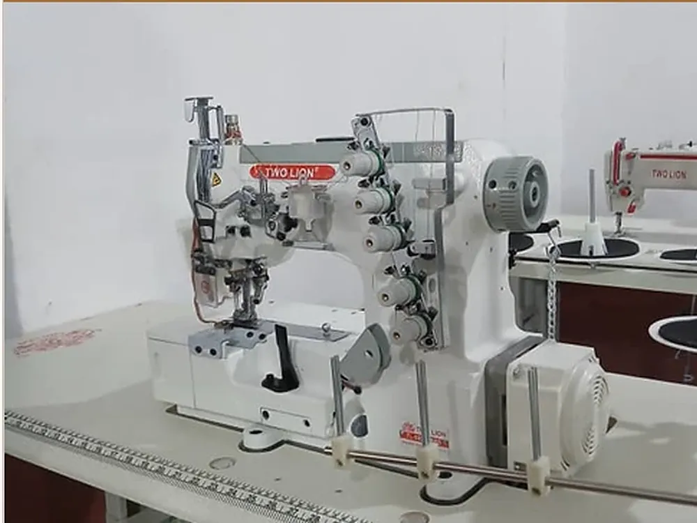 An interlock sewing machine on the floor at Klot Planet Plus