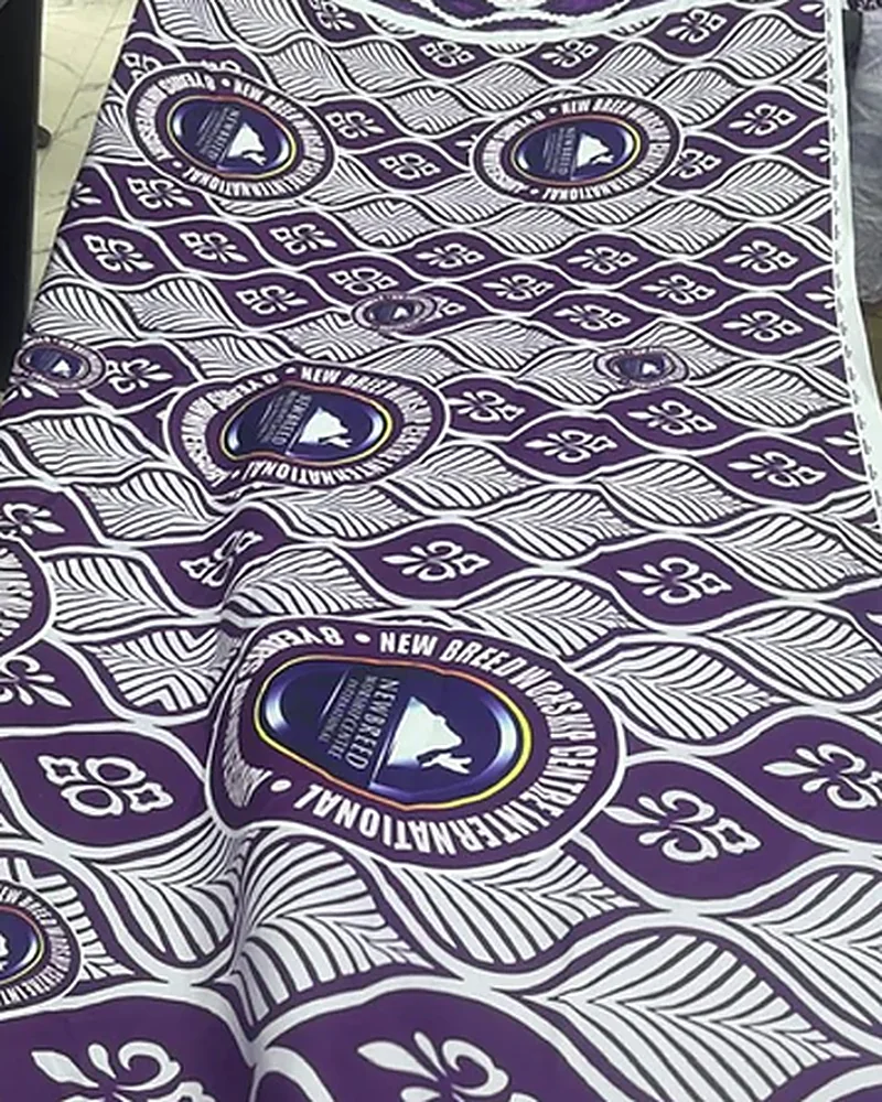New Breed International Wrapper — Purple Ankara